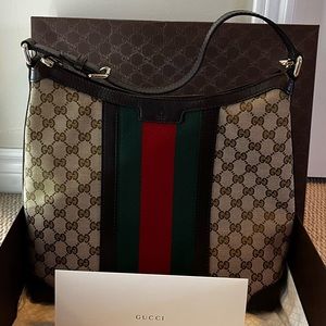 Gucci Purse as close to new as you will find